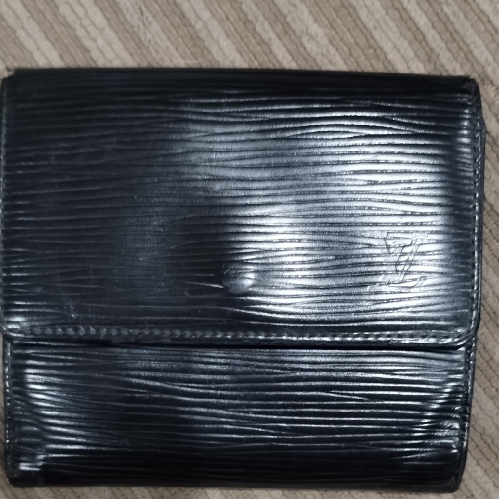 Louis Vuitton Black Wallet with Leather Texture and Compact Design